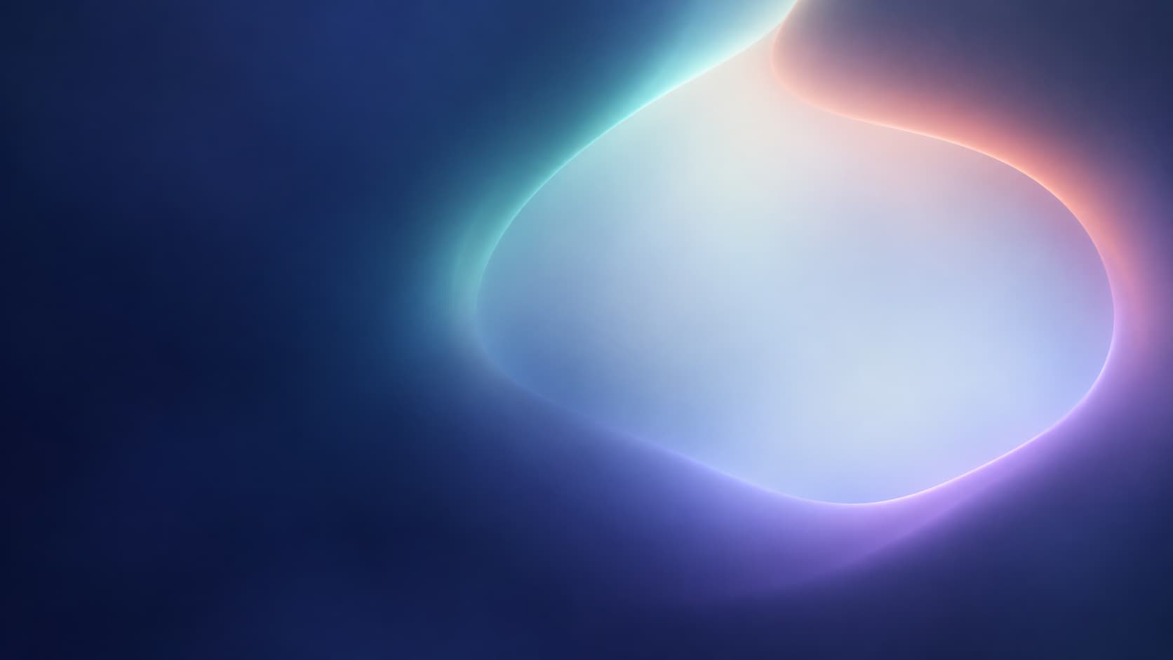 An immense softly bounded indigo optical field surrounds a large pale asymmetric opening slightly right of centre.